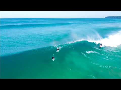 Surfer at Parsons beach enjoying a perfect wave