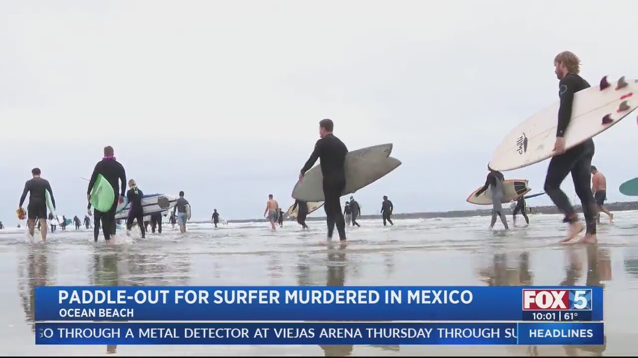 Slain surfer honored with memorial paddle-out in Ocean Beach