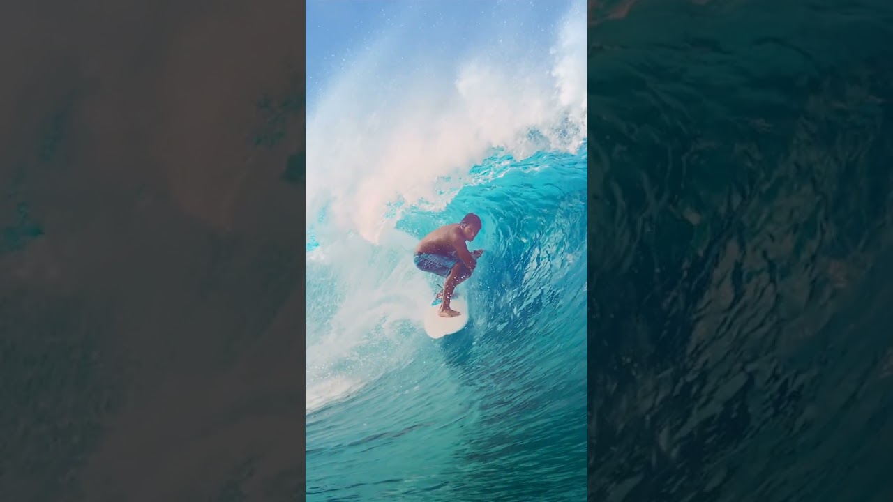 Extreme surfing big barrel ocean wave in slow motion